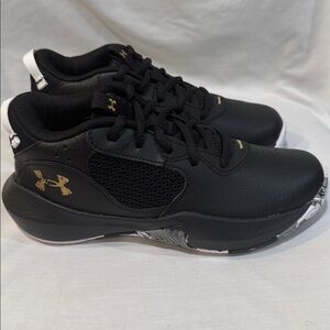 Under Armour PS Lockdown 6 Youth Black Athletic Shoes with Metallic Gold Logo